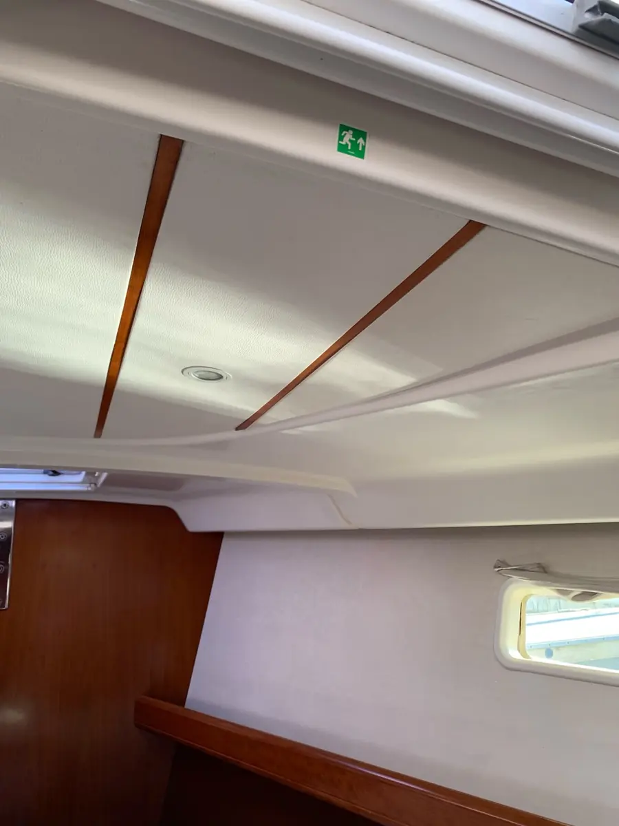 Clean, bright cabin ceiling lining with timber trim